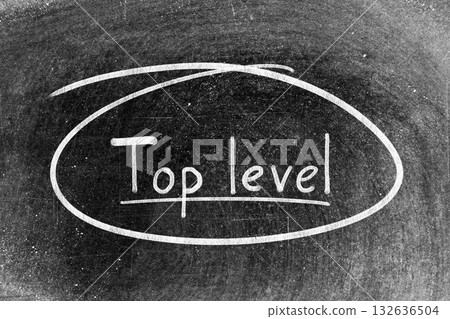 White chalk hand writing in word top level and circle shape on blackboard background 132636504