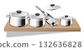 Stainless cookware and utensils. Clean shelf layout. A realistic kitchen scene for 132636828