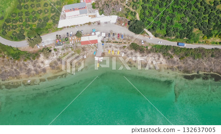 Lake Kournas in Crete aerial view of pedal boat rental clear water and scenic Greek nature. 132637005