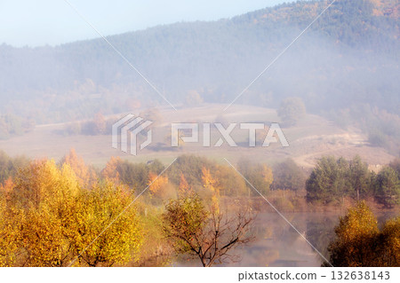 Autumn foggy forest and lake, Bulgaria Autumn foggy forest and lake, Bulgaria 132638143