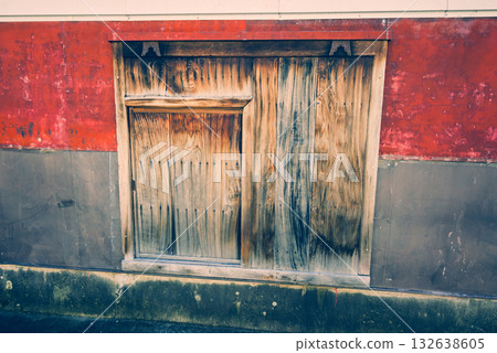 Fence with a sneak door Fence with a sneak door 132638605