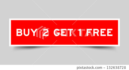 Red color square shape sticker label with word buy 2 get 1 free on gray background Red color square shape sticker label with word buy 2 get 1 free on gray background 132638728