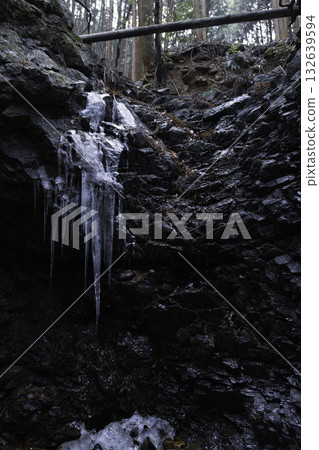Winter forest cave, icicles that look like ice Winter forest cave, icicles that look like ice 132639594