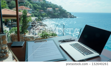 Laptop and smartphone on a wooden table with a blurred background in a modern workspace Laptop and smartphone on a wooden table with a blurred background in a modern workspace 132640261