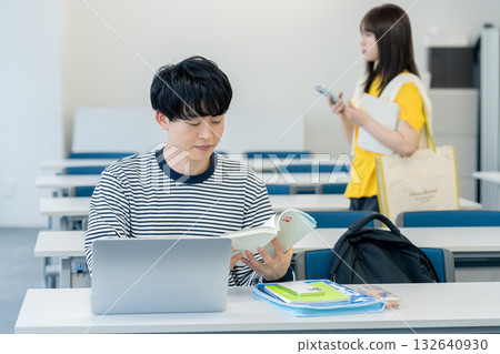 College students taking classes in the classroom College students taking classes in the classroom 132640930