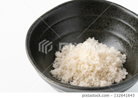 Close-up of a small bowl of seaweed salt Close-up of a small bowl of seaweed salt 132641643