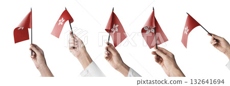 The Hong Kong flag in hand in different angles on a white background 132641694