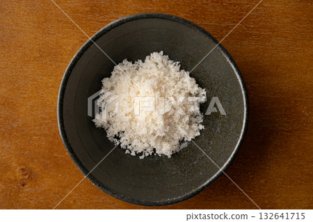 Moshio seaweed salt in a small bowl Moshio seaweed salt in a small bowl 132641715