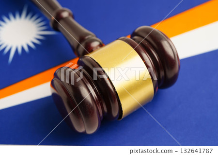 Marshall Islands law, Legal, justice and agreement, wooden court gavel on flag. Marshall Islands law, Legal, justice and agreement, wooden court gavel on flag. 132641787