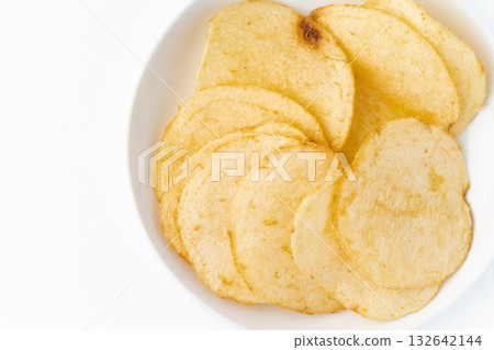 Close-up of potato chips on a plate 132642144