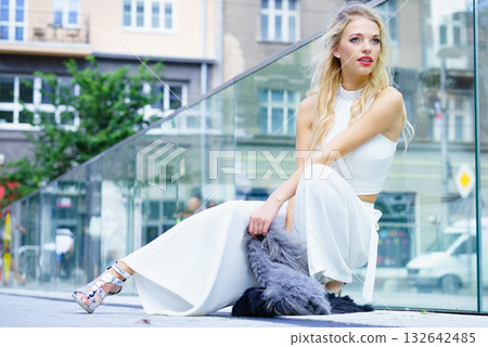 Woman wearing crop top and culottes Woman wearing crop top and culottes 132642485