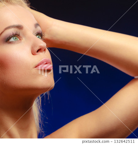 Portrait pensive girl long blond hair Portrait pensive girl long blond hair 132642511