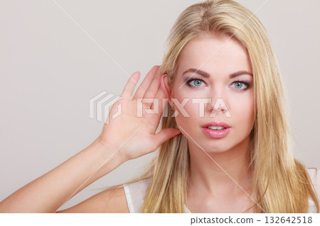 gossip girl with hand behind ear spying gossip girl with hand behind ear spying 132642518