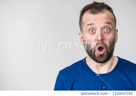 Astonished shocked adult man 132642595