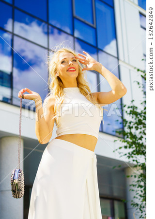 Woman wearing crop top and culottes Woman wearing crop top and culottes 132642849