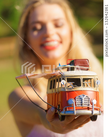 Woman holding hippie van object model 132642861