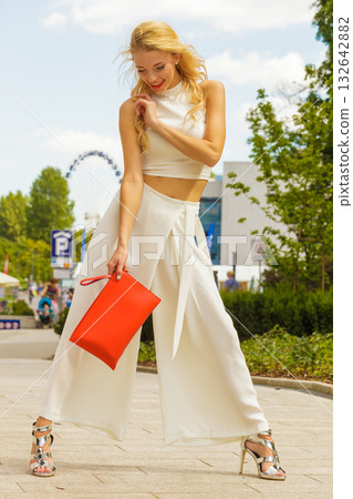 Woman wearing crop top and culottes 132642882