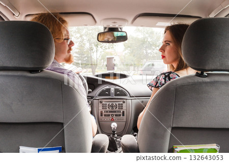 Man and woman in car Man and woman in car 132643053