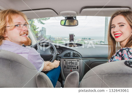 Happy man and woman in car Happy man and woman in car 132643061