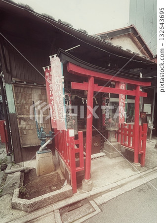 A small shrine in the fading past of everyday Japanese life A small shrine in the fading past of everyday Japanese life 132643695
