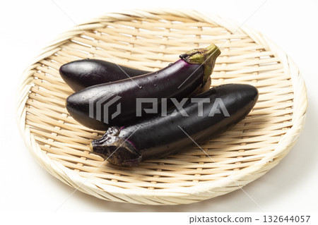 Eggplant in a basket on a white background 132644057