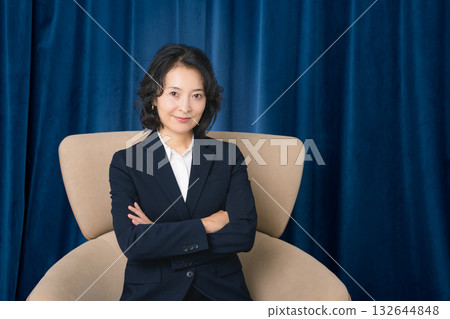 A confident middle-aged woman who has succeeded in business 132644848