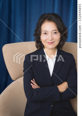 A confident middle-aged woman who has succeeded in business 132644855