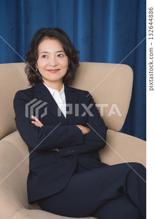 A confident middle-aged woman who has succeeded in business 132644886