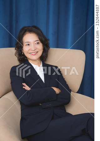 A confident middle-aged woman who has succeeded in business A confident middle-aged woman who has succeeded in business 132644887