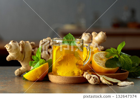 Ginger tea with lemon and mint. Ginger tea with lemon and mint. 132647374