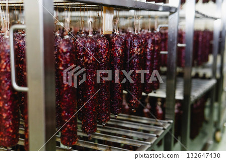 Smoked sausage production line in the factory Smoked sausage production line in the factory 132647430