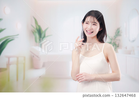 Lively smiling young woman in salon Lively smiling young woman in salon 132647468