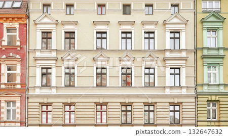 Facades of old residential buildings in Szczecin, Poland. 132647632