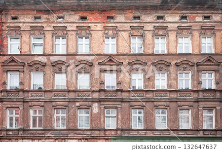 Facades of old residential buildings in Szczecin, Poland. 132647637