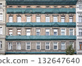Facades of old residential buildings in Szczecin, Poland. 132647640