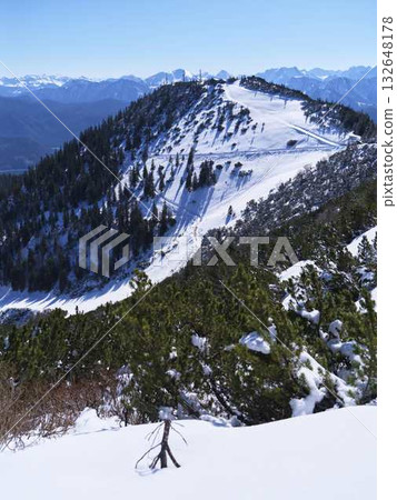 Snow-covered mountains offer stunning views and outdoor adventure in winter Snow-covered mountains offer stunning views and outdoor adventure in winter 132648178