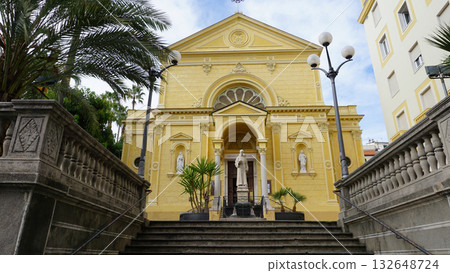 Church of the Capuchin Friars with the statue of St Francis of Assisi on the churchyard in the city center Church of the Capuchin Friars with the statue of St Francis of Assisi on the churchyard in the city center 132648724