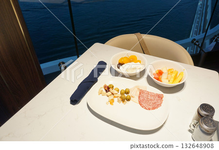 Dining Room Buffet aboard the abstract luxury cruise ship. Healthy breakfast at modern liner concept Dining Room Buffet aboard the abstract luxury cruise ship. Healthy breakfast at modern liner concept 132648908