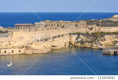 Aerial view of Fort Ricasoli East Breakwater. Waves, Mediterranean sea. Malta island Aerial view of Fort Ricasoli East Breakwater. Waves, Mediterranean sea. Malta island 132649092