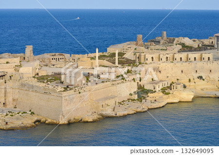 Aerial view of Fort Ricasoli East Breakwater. Waves, Mediterranean sea. Malta island Aerial view of Fort Ricasoli East Breakwater. Waves, Mediterranean sea. Malta island 132649095