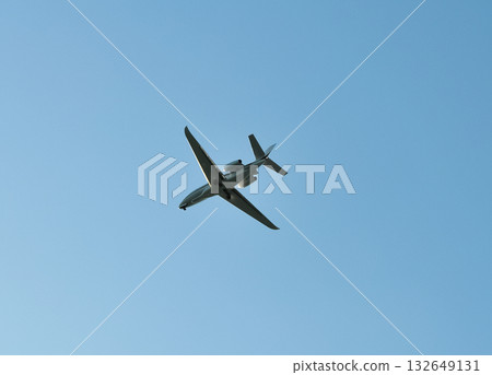small plane flying low in the sky with space for text small plane flying low in the sky with space for text 132649131