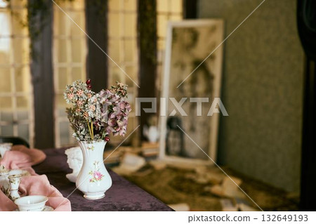 Charming Vintage Decor Featuring Dried Flowers and Enchanting Antique Touches Throughout 132649193
