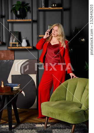 confident woman in modern lounge, focused professional woman negotiating deals confidently indoors 132649203