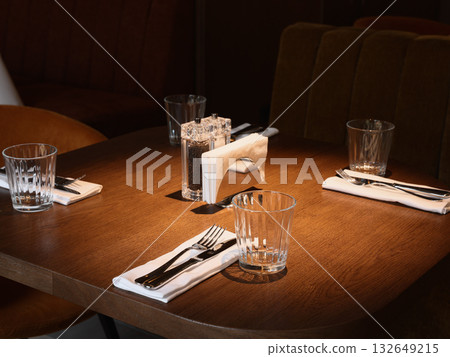 informal meal gathering, group of individuals enjoying relaxed meal together around rustic wooden informal meal gathering, group of individuals enjoying relaxed meal together around rustic wooden 132649215