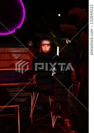 night lounge supervisor, calm host in stylish setting, attentive man supervising lounge ambiance 132649222