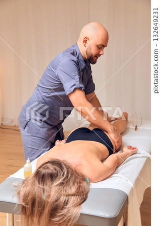 Enjoy a Relaxing and Rejuvenating Massage Therapy Session in a Tranquil and Calming Environment Enjoy a Relaxing and Rejuvenating Massage Therapy Session in a Tranquil and Calming Environment 132649231