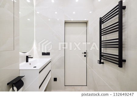 Discover the beauty of a modern bathroom design featuring stylish black accents and sleek fixtures Discover the beauty of a modern bathroom design featuring stylish black accents and sleek fixtures 132649247