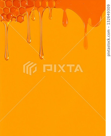 The delicious golden honey drips from the honeycomb structure, melting in your mouth. 132649309