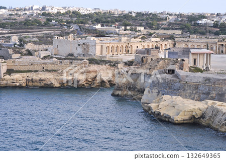 Aerial view of Fort Ricasoli East Breakwater. Waves, Mediterranean sea. Malta island Aerial view of Fort Ricasoli East Breakwater. Waves, Mediterranean sea. Malta island 132649365