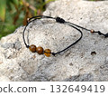 Bracelet with three natural stones. Amulet bracelet with a black thread. 132649419